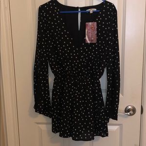 Star-pattered romper with lace detail on arms